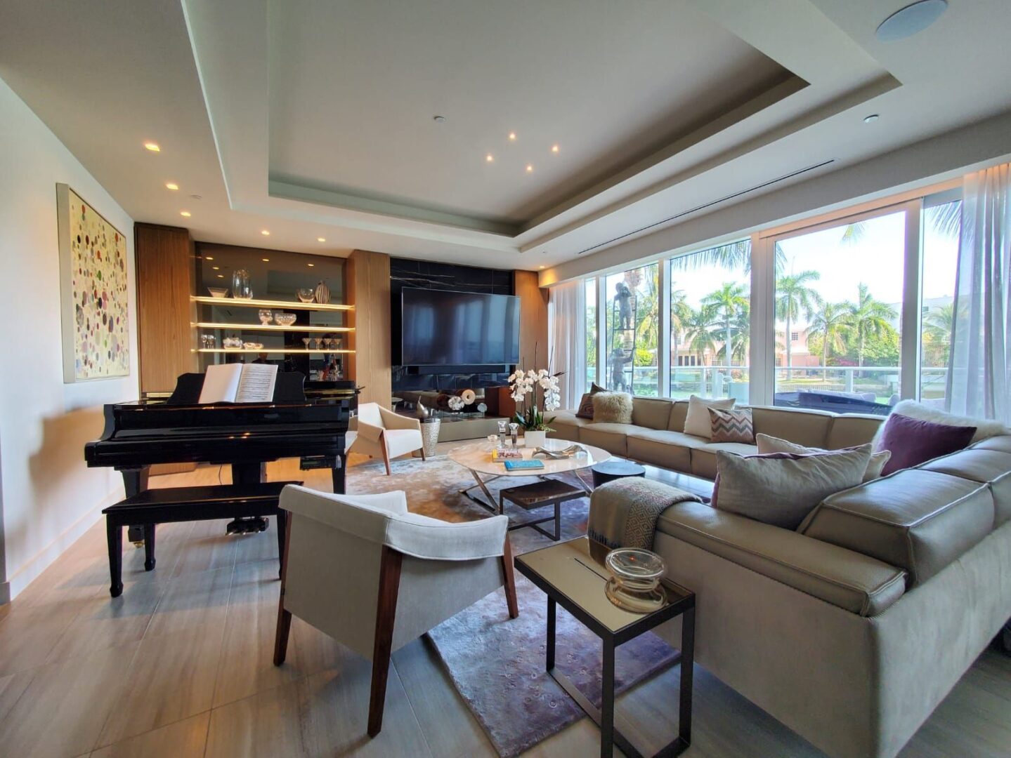A living room with a piano and couch
